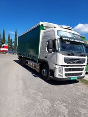 VOLVO FM 450 camión con lona corredera